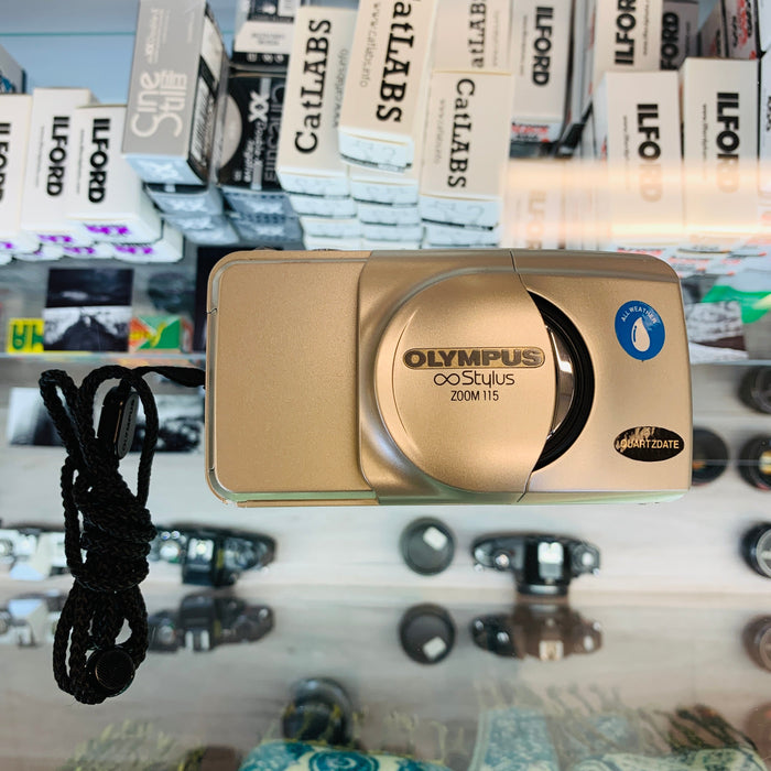 Olympus Stylus Zoom 115 Point and Shoot with Case