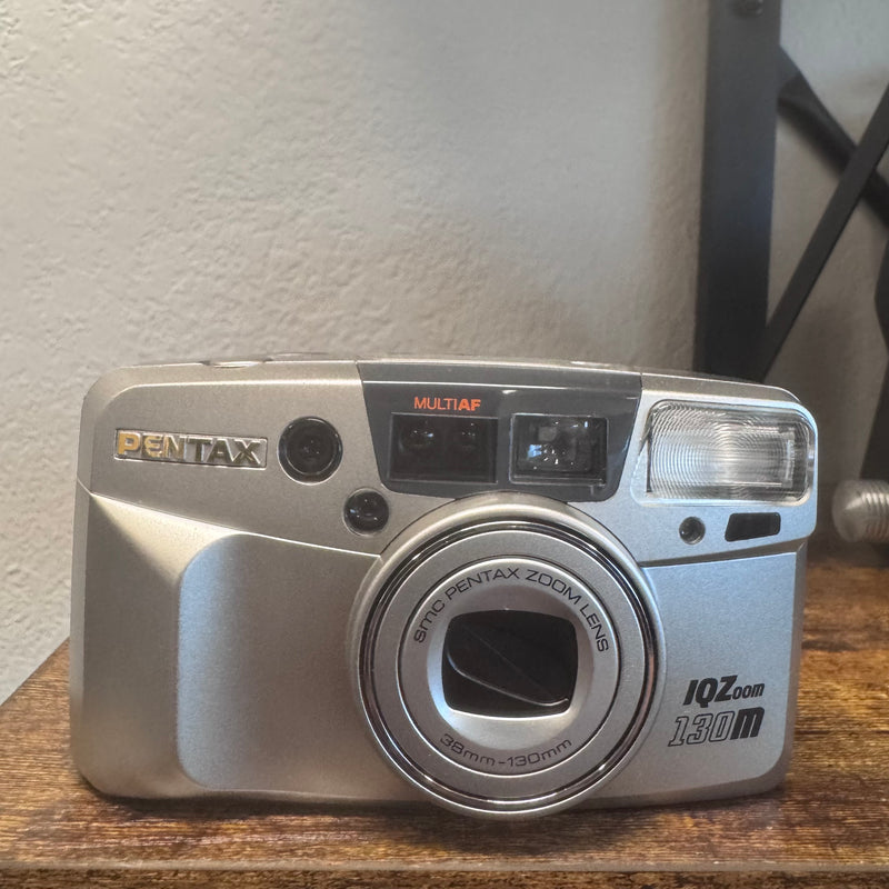 Pentax IQZoom 130M — 35mm Point & Shoot Film Camera (38-130mm Zoom, Multi-AF, Built-in Flash)