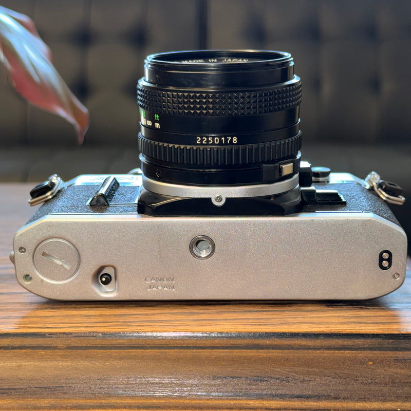 Canon AE-1 35mm SLR + Canon FD 50mm f/1.8 Lens