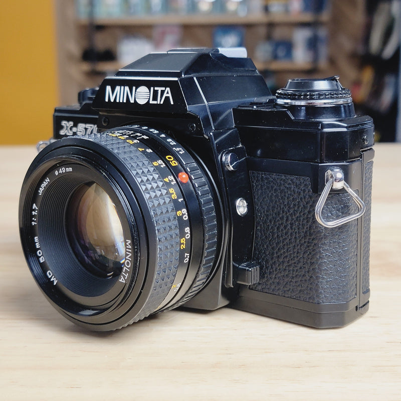 Minolta X-570 SLR with 50mm f/1.7 lens
