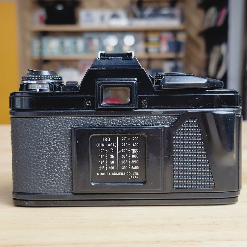 Minolta X-570 SLR with 50mm f/1.7 lens