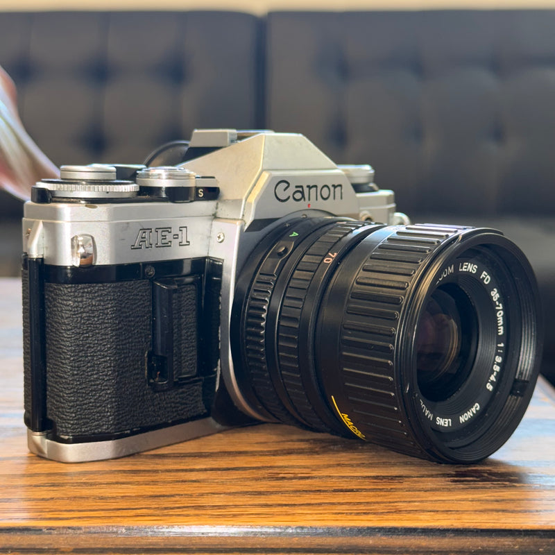 Canon AE-1 35mm SLR + Canon FD 35-70mm f/3.5-4.5 Zoom Lens