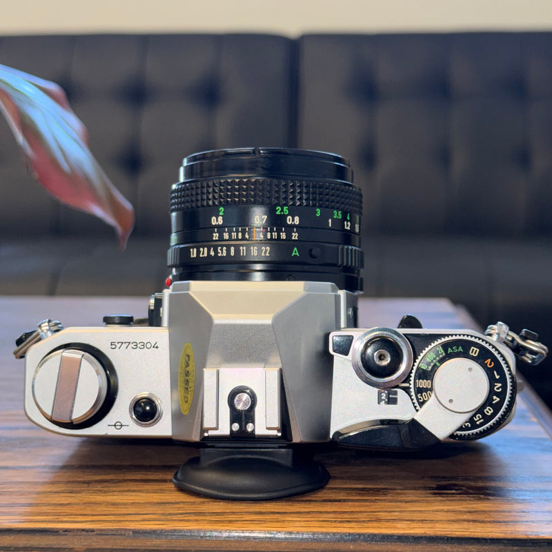 Canon AE-1 35mm SLR + Canon FD 50mm f/1.8 Lens