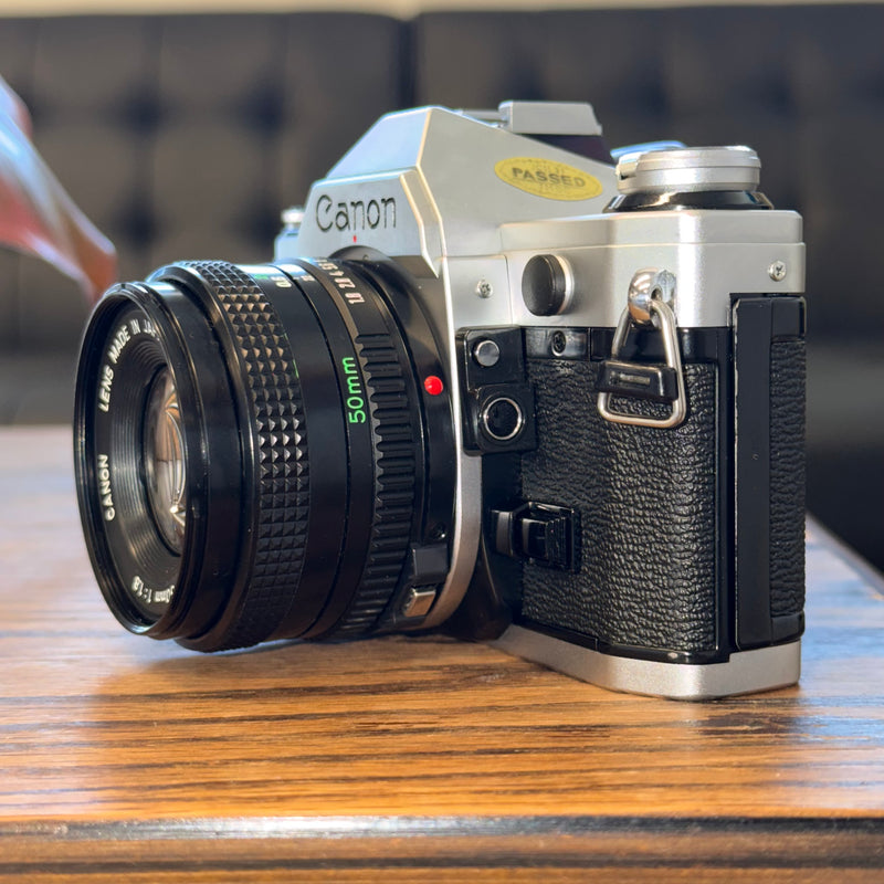 Canon AE-1 35mm SLR + Canon FD 50mm f/1.8 Lens