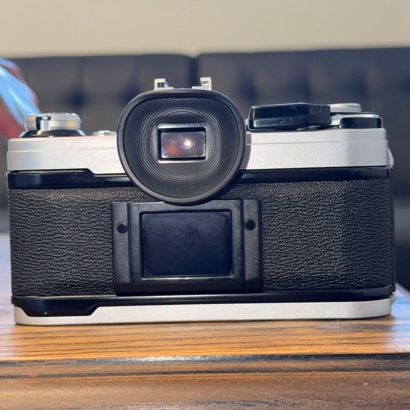 Canon AE-1 35mm SLR + Canon FD 50mm f/1.8 Lens