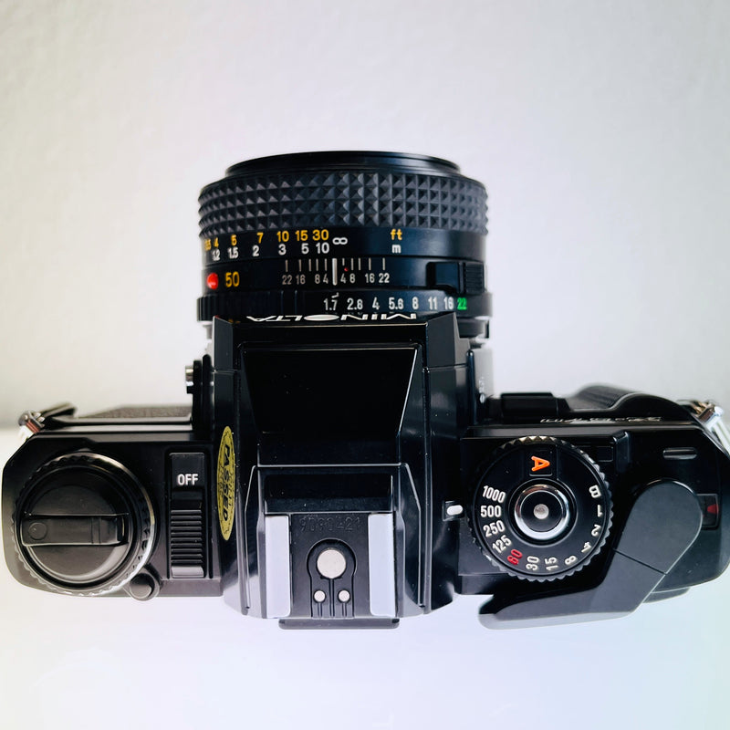 Minolta X-570 SLR with 50mm f/1.7 lens S#9090421