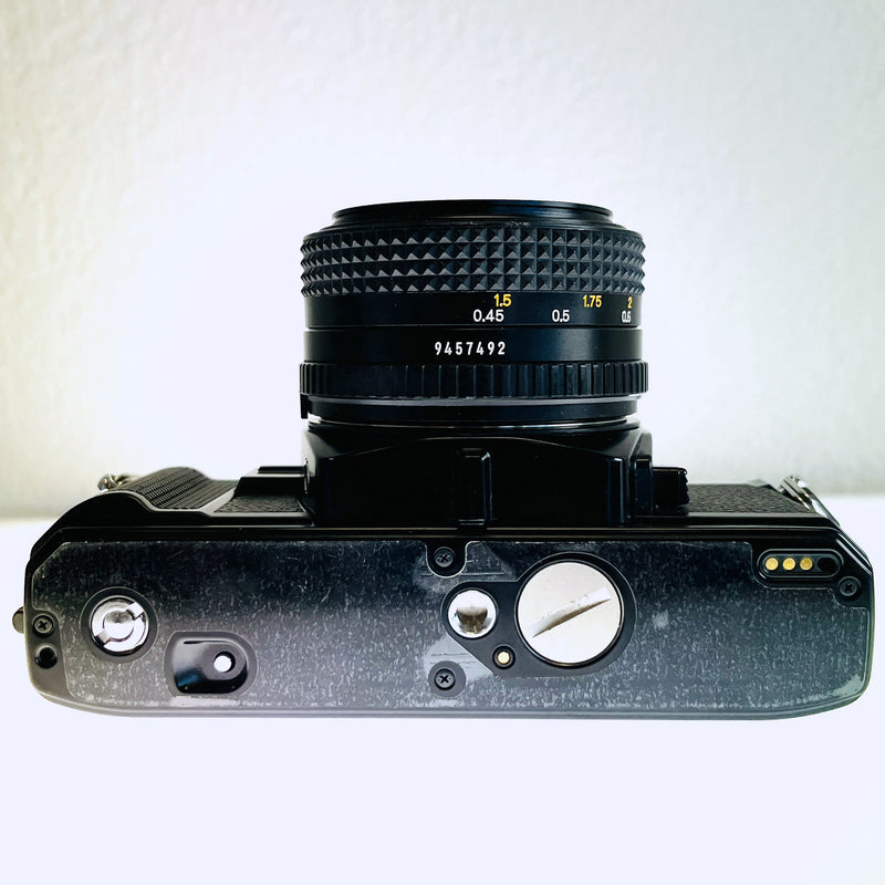 Minolta X-570 SLR with 50mm f/1.7 lens S#9090421