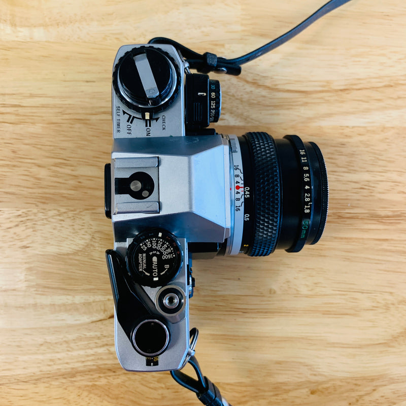 Olympus OM10 Chrome 35mm Camera w/ 50mm Lens