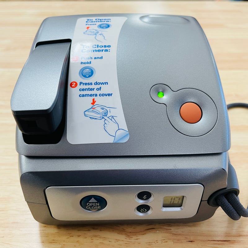 Polaroid One 600 Instant film camera with built in flash