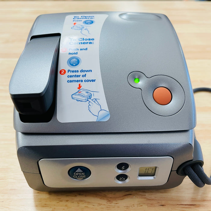 Polaroid One 600 Instant film camera with built in flash