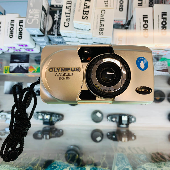 Olympus Stylus Zoom 115 Point and Shoot with Case