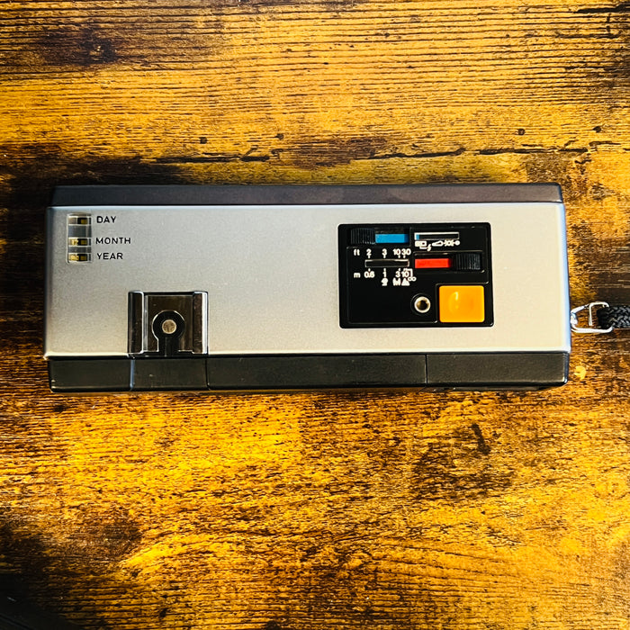 Canon 110ED with Vivitar Auto 215 Flash