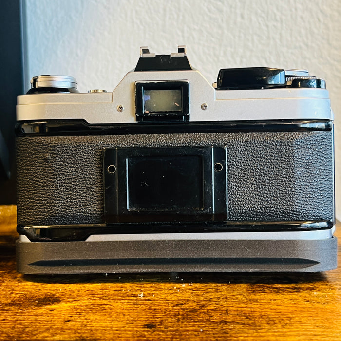 Canon AE-1 with Five Star MC Auto 35-75mm 3.5-4.8 + Grip